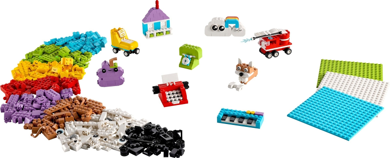 Collection of colorful building blocks and toys on a white background