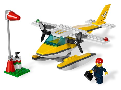LEGO set with a yellow and white airplane, propellers, and a LEGO figure on a white background