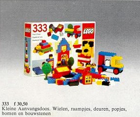 LEGO set with building blocks and instructions on a gray background