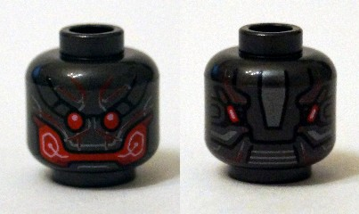 Display of LEGO part no. 3626cpb1308 which is a Pearl Dark Gray Minifigure, Head Alien with Red Eyes and Mouth Pattern, Hollow Stud 