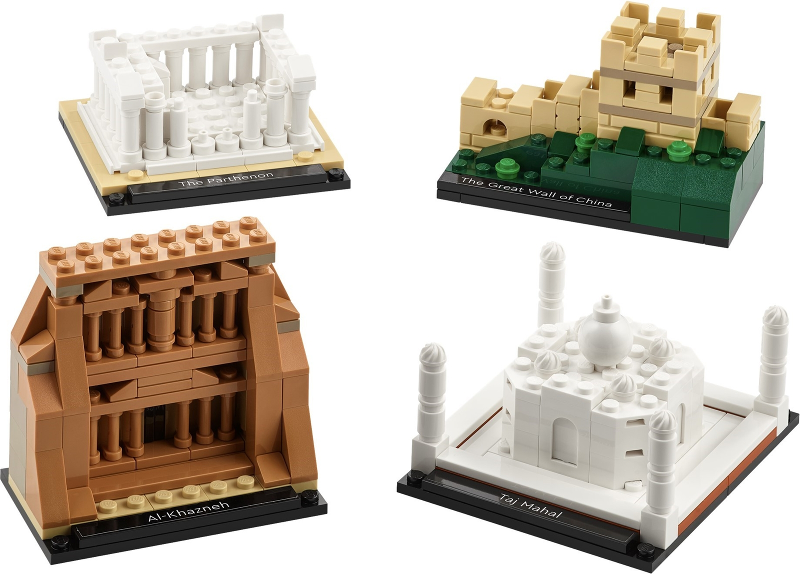 Four architectural models made from building blocks on a white background