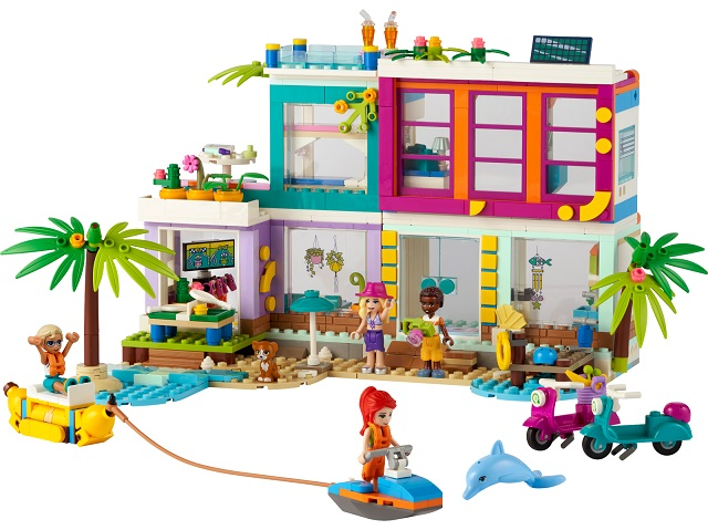 LEGO set of a colorful beach house with characters and toys on a white background