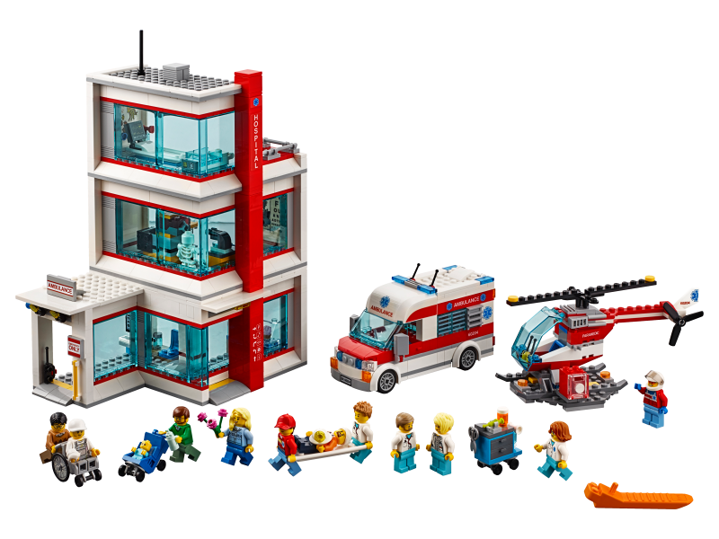 LEGO emergency medical center set with building, ambulance, helicopter, and figures on a white background