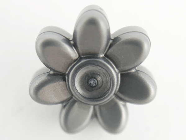 Display of LEGO part no. 65468e which is a Flat Silver Minifigure, Utensil Trolls Flower, 7 Petals and Pin 