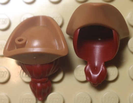 Display of LEGO part no. 67043pb03 which is a Dark Red Minifigure, Hair Combo, Hair with Hat, Long Hair with Ponytail and Molded Medium Nougat Pirate Tricorne Hat Pattern (BAM) 