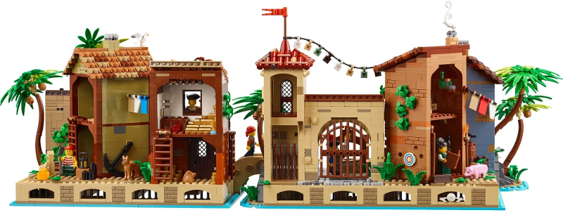 Toy model of a tropical village with buildings, animals, and palm trees.