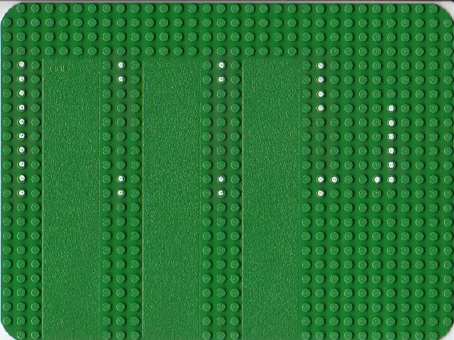 Display of LEGO part no. 915p01 which is a Green Baseplate 24 x 32 with Three Driveways with Sets 357 / 570 Dots Pattern 