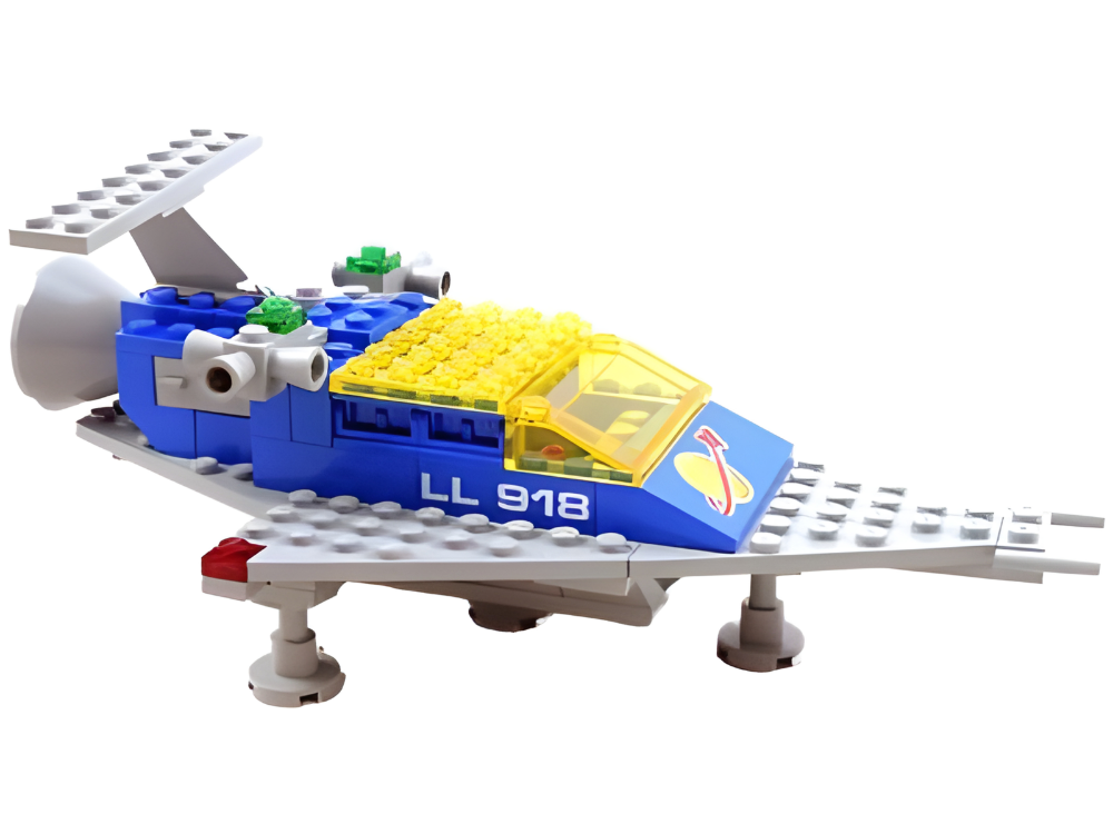 Toy spaceship model made of interlocking bricks on a white background