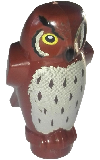 Display of LEGO part no. 92084pb01 which is a Reddish Brown Owl, Angular Features with Black Beak, Yellow Eyes, and Tan Chest Feathers Pattern (HP Pigwidgeon) 