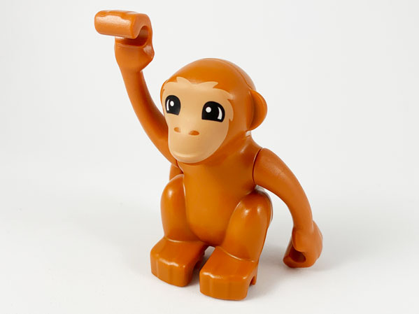 Display of LEGO part no. bb0953c01pb01 which is a Dark Orange Duplo Monkey, Curled Tail Turned to Side with Nougat Face Pattern 