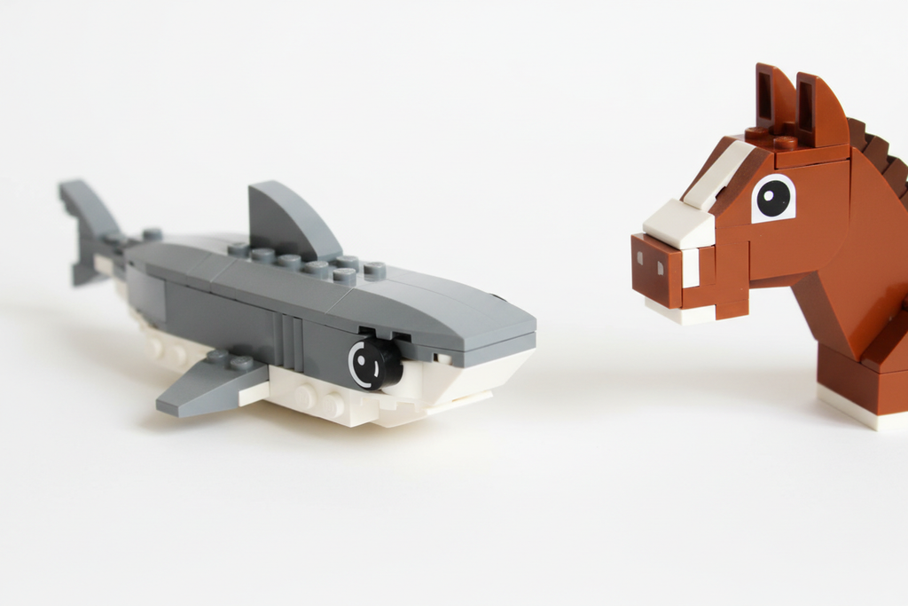 LEGO shark swimming onto the image from the left and LEGO horse peaking into the image on the right