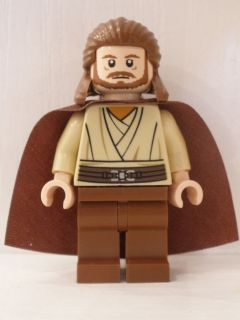 This LEGO minifigure is called, Qui-Gon Jinn, Light Nougat Head, Reddish Brown Legs and Cape . It's minifig ID is sw0322.