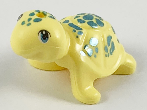 Display of LEGO part no. 11603pb04 which is a Bright Light Yellow Turtle, Friends / Elves with Metallic Light Blue Eyes and Spots Pattern 