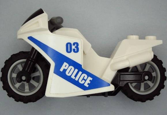 Display of LEGO part no. 18895c02pb03 Motorcycle Sport Bike with Black Windshield Pattern, Black Frame, Light Bluish Gray Wheels and Dark Bluish Gray Handlebars with Gold Badge with '03' and 'POLICE' Pattern on Both Sides (Stickers), Set 60139  which is a White Motorcycle Sport Bike with Black Windshield Pattern, Black Frame, Light Bluish Gray Wheels and Dark Bluish Gray Handlebars with Gold Badge with '03' and 'POLICE' Pattern on Both Sides (Stickers), Set 60139 
