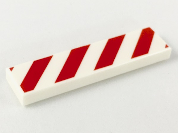 Display of LEGO part no. 2431p02 Tile 1 x 4 with Red and Danger Stripes (Red Corners) Pattern  which is a White Tile 1 x 4 with Red and Danger Stripes (Red Corners) Pattern 