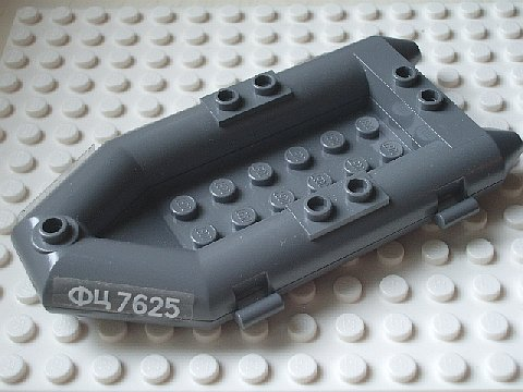 Display of LEGO part no. 30086pb01 Boat, Rubber Raft, Small with White Cyrillic Characters 'ФЦ 7625' (FTS 7625) Pattern on Both Sides (Stickers), Set 7625  which is a Dark Bluish Gray Boat, Rubber Raft, Small with White Cyrillic Characters 'ФЦ 7625' (FTS 7625) Pattern on Both Sides (Stickers), Set 7625 
