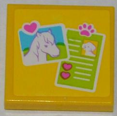 Display of LEGO part no. 3068bpb0755 Tile 2 x 2 with Groove with Horse Head Photo and Dog ID Pattern (Sticker), Set 3188  which is a Yellow Tile 2 x 2 with Groove with Horse Head Photo and Dog ID Pattern (Sticker), Set 3188 