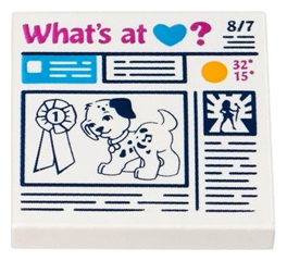 Display of LEGO part no. 3068bpb0933 Tile 2 x 2 with Groove with Prize Ribbon, Dog and 'What's at Heart?' Newspaper Pattern  which is a White Tile 2 x 2 with Groove with Prize Ribbon, Dog and 'What's at Heart?' Newspaper Pattern 