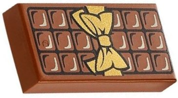Display of LEGO part no. 3069bpb0440 Tile 1 x 2 with Groove with Candy Bar Chocolate Blocks and Gold Bow Pattern  which is a Reddish Brown Tile 1 x 2 with Groove with Candy Bar Chocolate Blocks and Gold Bow Pattern 
