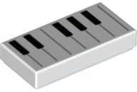Display of LEGO part no. 3069bpb0761 Tile 1 x 2 with Groove with Black and Piano Keys Pattern  which is a White Tile 1 x 2 with Groove with Black and Piano Keys Pattern 