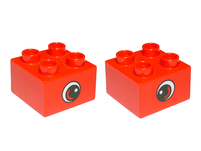 Display of LEGO part no. 3437pb049 Duplo, Brick 2 x 2 with Eye, Small with White Spot and Curve Pattern on Two Sides  which is a Red Duplo, Brick 2 x 2 with Eye, Small with White Spot and Curve Pattern on Two Sides 