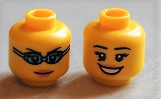 Display of LEGO part no. 3626bpb0688 Minifigure, Head Dual Sided Female Open Smile / Swimming Goggles Pattern, Blocked Open Stud  which is a Yellow Minifigure, Head Dual Sided Female Open Smile / Swimming Goggles Pattern, Blocked Open Stud 