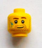 Display of LEGO part no. 3626bpb0913 Minifigure, Head Beard Stubble, Brown Eyebrows and Paint Stains Pattern, Blocked Open Stud  which is a Yellow Minifigure, Head Beard Stubble, Brown Eyebrows and Paint Stains Pattern, Blocked Open Stud 