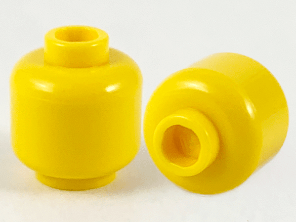 Display of LEGO part no. 3626c Minifigure, Head (Plain), Hollow Stud  which is a Yellow Minifigure, Head (Plain), Hollow Stud 