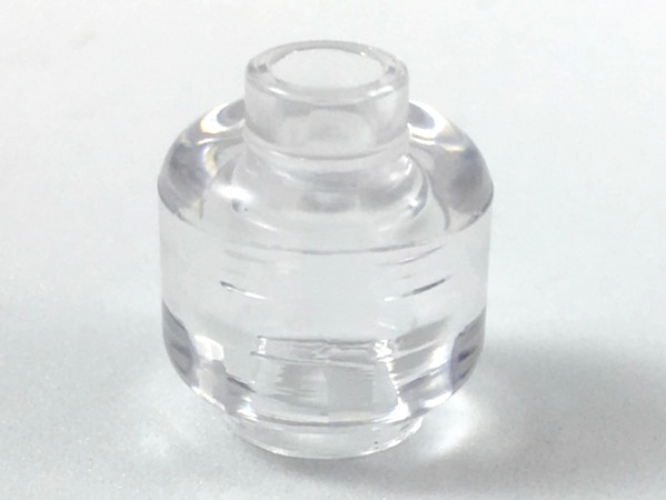 Display of LEGO part no. 3626c Minifigure, Head (Plain), Hollow Stud  which is a Trans-Clear Minifigure, Head (Plain), Hollow Stud 