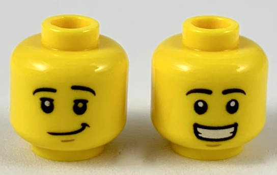 Display of LEGO part no. 3626cpb2308 Minifigure, Head Dual Sided Black Eyebrows, Lopsided Grin Pattern / Smile Showing Teeth, Hollow Stud  which is a Yellow Minifigure, Head Dual Sided Black Eyebrows, Lopsided Grin Pattern / Smile Showing Teeth, Hollow Stud 