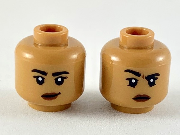Display of LEGO part no. 3626cpb2362 Minifigure, Head Dual Sided Female, Black Eyebrows, Reddish Brown Lips, Lopsided Grin / Right Eyebrow Raised Pattern, Hollow Stud  which is a Medium Nougat Minifigure, Head Dual Sided Female, Black Eyebrows, Reddish Brown Lips, Lopsided Grin / Right Eyebrow Raised Pattern, Hollow Stud 