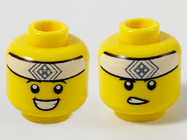 Display of LEGO part no. 3626cpb2608 Minifigure, Head Dual Sided White Headband with Sand Blue Square Symbol, Smile / Gritted Teeth Pattern, Hollow Stud  which is a Yellow Minifigure, Head Dual Sided White Headband with Sand Blue Square Symbol, Smile / Gritted Teeth Pattern, Hollow Stud 