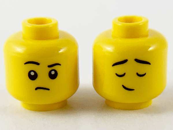 Display of LEGO part no. 3626cpb2742 Minifigure, Head Dual Sided Child Black Eyebrows, Raised Right Eyebrow / Eyes Closed Raised Eyebrows Pattern, Hollow Stud  which is a Yellow Minifigure, Head Dual Sided Child Black Eyebrows, Raised Right Eyebrow / Eyes Closed Raised Eyebrows Pattern, Hollow Stud 