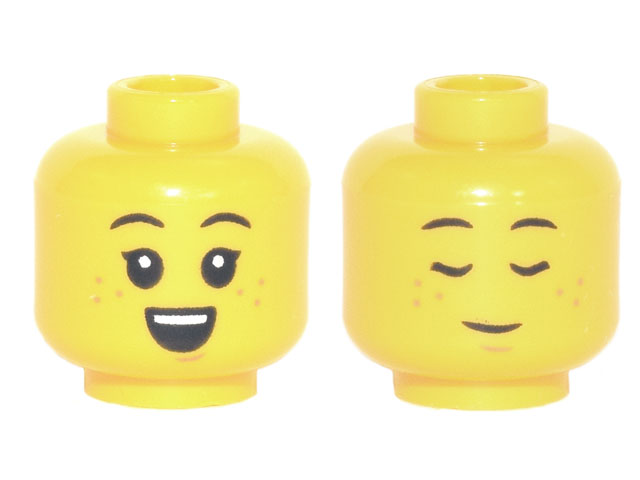 Display of LEGO part no. 3626cpb2913 Minifigure, Head Dual Sided, Child, Black Eyebrows, Freckles, Small Open Smile / Sleeping Pattern, Hollow Stud  which is a Yellow Minifigure, Head Dual Sided, Child, Black Eyebrows, Freckles, Small Open Smile / Sleeping Pattern, Hollow Stud 