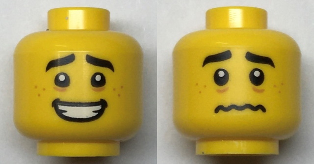 Display of LEGO part no. 3626cpb2974 Minifigure, Head Dual Sided, Black Eyebrows, Medium Nougat Freckles, Open Mouth Smile / Scared Worried Pattern, Hollow Stud  which is a Yellow Minifigure, Head Dual Sided, Black Eyebrows, Medium Nougat Freckles, Open Mouth Smile / Scared Worried Pattern, Hollow Stud 