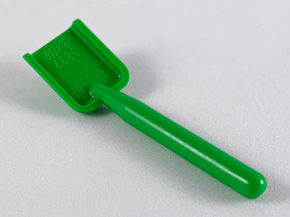 Display of LEGO part no. 3837 which is a Bright Green Minifigure, Utensil Shovel / Spade, Handle with Round End 