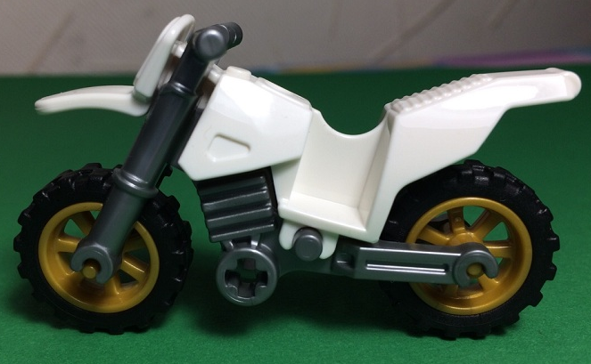 Display of LEGO part no. 50860c04 Motorcycle Dirt Bike with Flat Silver Chassis and Pearl Gold Wheels  which is a White Motorcycle Dirt Bike with Flat Silver Chassis and Pearl Gold Wheels 