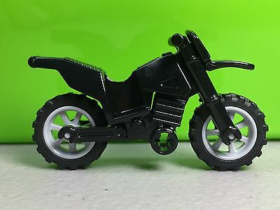 Display of LEGO part no. 50860c11 Motorcycle Dirt Bike with Chassis (Long Fairing Mounts) and Light Bluish Gray Wheels  which is a Black Motorcycle Dirt Bike with Chassis (Long Fairing Mounts) and Light Bluish Gray Wheels 