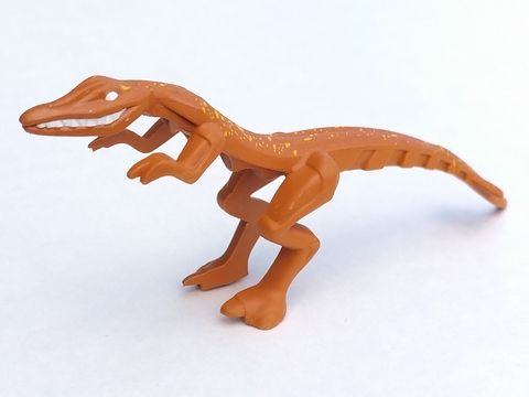Display of LEGO part no. 54125pb01 Dinosaur Mutant Lizard with Yellow Specks on Back Pattern  which is a Dark Orange Dinosaur Mutant Lizard with Yellow Specks on Back Pattern 