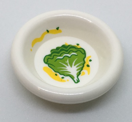 Display of LEGO part no. 6256pb05 Minifigure, Utensil Dish 3 x 3 with Green and Lime Lettuce Leaf and Yellow Splotches Pattern  which is a White Minifigure, Utensil Dish 3 x 3 with Green and Lime Lettuce Leaf and Yellow Splotches Pattern 