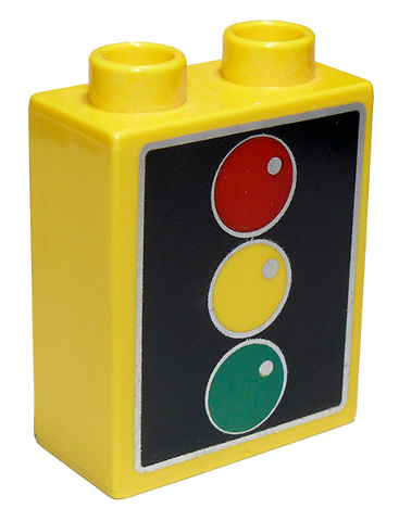 Display of LEGO part no. 76371pb004 Duplo, Brick 1 x 2 x 2 with Bottom Tube with Traffic Light Pattern  which is a Yellow Duplo, Brick 1 x 2 x 2 with Bottom Tube with Traffic Light Pattern 