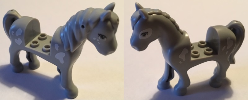 Display of LEGO part no. 93083c01pb17 Horse with 2 x 2 Cutout with Eyes, White Patch Around Left Eye and White Spots Pattern  which is a Light Bluish Gray Horse with 2 x 2 Cutout with Eyes, White Patch Around Left Eye and White Spots Pattern 