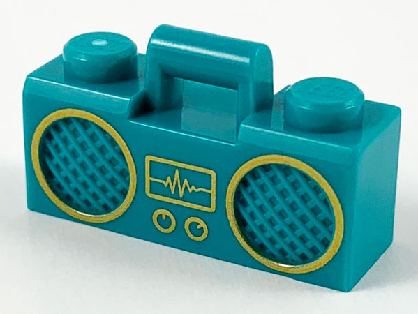 Display of LEGO part no. 93221pb06 Minifigure, Utensil Radio Boom Box with Bar Handle with Gold Sound Wave Display and Rimmed Speakers Pattern  which is a Dark Turquoise Minifigure, Utensil Radio Boom Box with Bar Handle with Gold Sound Wave Display and Rimmed Speakers Pattern 