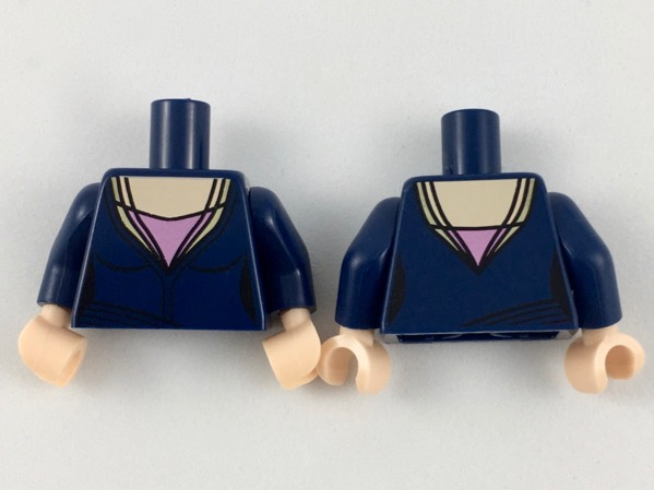 Display of LEGO part no. 973pb3255c01 Torso Female Low-Cut Top, Light Nougat Neck and Pink Triangle Pattern / Arms / Light Nougat Hands  which is a Dark Blue Torso Female Low-Cut Top, Light Nougat Neck and Pink Triangle Pattern / Arms / Light Nougat Hands 