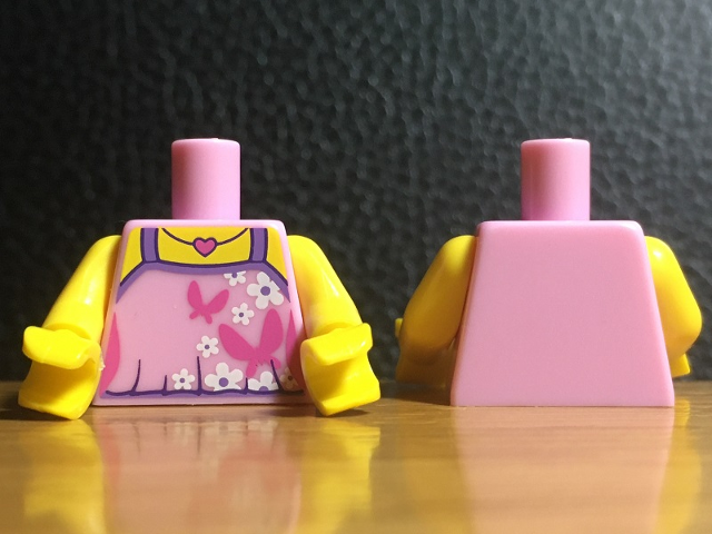 Display of LEGO part no. 973pb4196c01 Torso Top with Dark Pink Butterflies, Heart Necklace and White Flowers without Back Print Pattern (BAM) / Yellow Arms / Yellow Hands  which is a Bright Pink Torso Top with Dark Pink Butterflies, Heart Necklace and White Flowers without Back Print Pattern (BAM) / Yellow Arms / Yellow Hands 