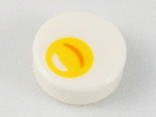 Display of LEGO part no. 98138pb088 which is a White Tile, Round 1 x 1 with Egg Yolk Pattern 