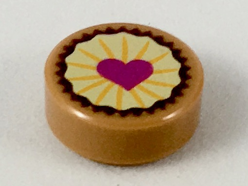 Display of LEGO part no. 98138pb094 which is a Medium Nougat Tile, Round 1 x 1 with Pastry, Magenta Heart on Bright Light Yellow Icing Pattern 