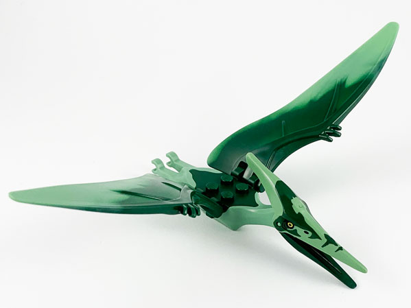 Display of LEGO part no. Ptera06 Dinosaur Pteranodon with Dark Green Back and Forehead  which is a Sand Green Dinosaur Pteranodon with Dark Green Back and Forehead 