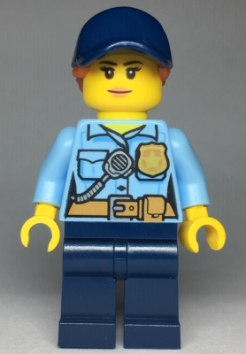 Display of LEGO City Police, City Officer Female, Bright Light Blue Shirt with Badge and Radio, Dark Blue Legs, Dark Blue Cap with Dark Orange Ponytail